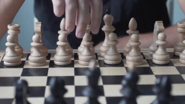 The man moves the white pawn forward - Footage, Video
