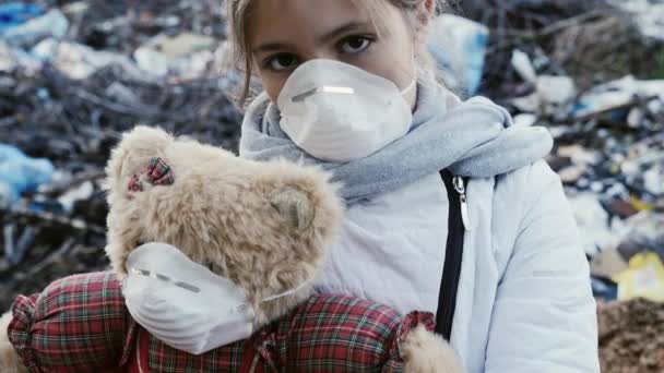 Young girl on the background of the dump - Footage, Video