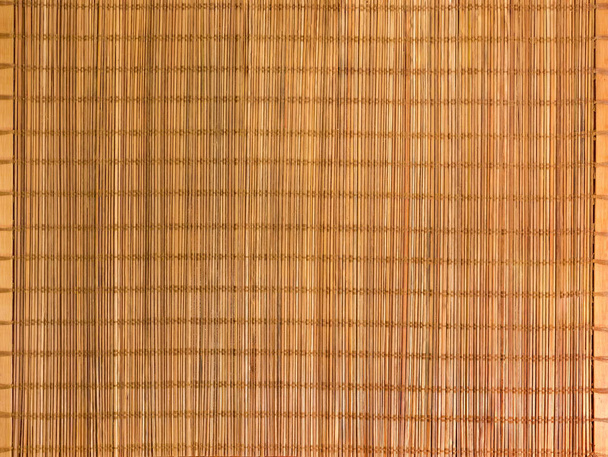 Taustaa tyhjä suorakulmainen kudottu bambu taulukko matto lähikuva
 - Valokuva, kuva