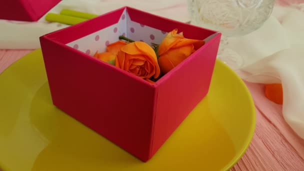 gift box rose flower plate slow motion hand - Footage, Video
