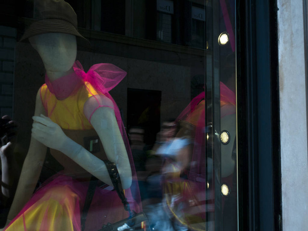 mannequin in a window of a luxury store in Piazza di Spagna Rome - 写真・画像