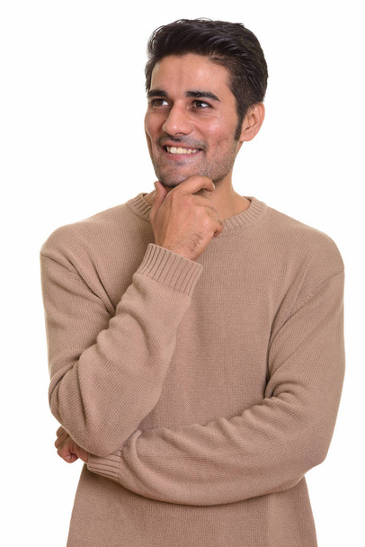 Joven hombre persa guapo sobre fondo blanco - Foto, imagen