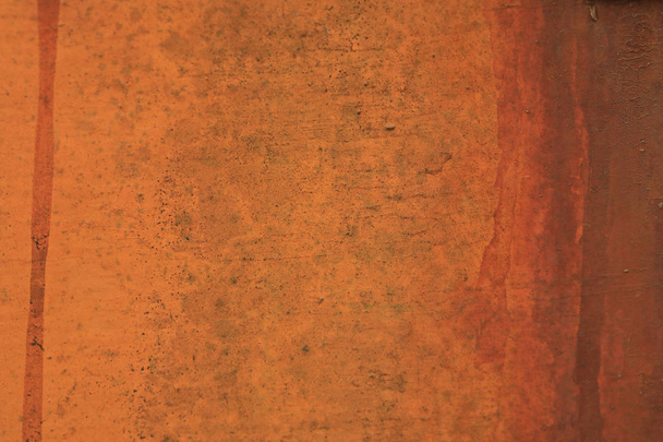 Pomarańczowy szorstki tło wyblakły zbliżenie - Zdjęcie, obraz