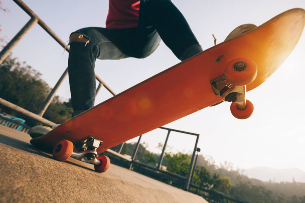 Cropped image of skateboarder skateboarding at skatepark - Фото, зображення