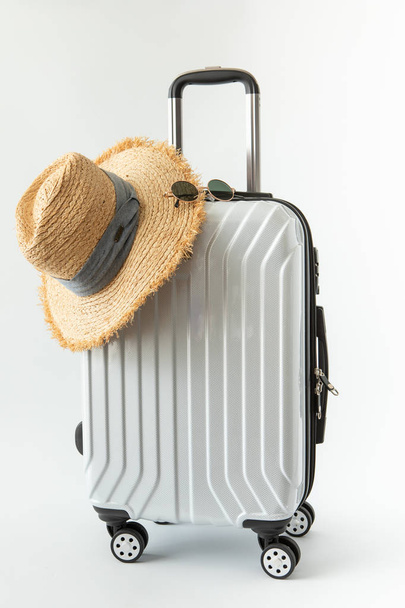 white baggage luggage carry on plane hat travel journey to destination long weekend holiday on white background - Fotoğraf, Görsel
