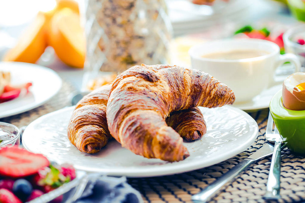 Breakfast served with coffee, orange juice, croissants, cereals and fruits. Balanced diet. - Photo, Image