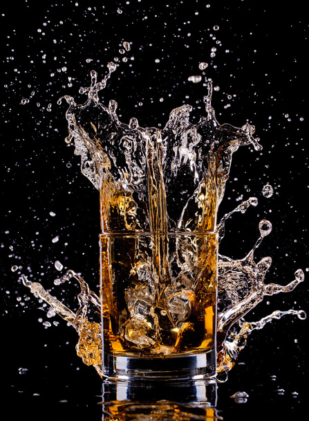 Glass with whisky - Foto, afbeelding