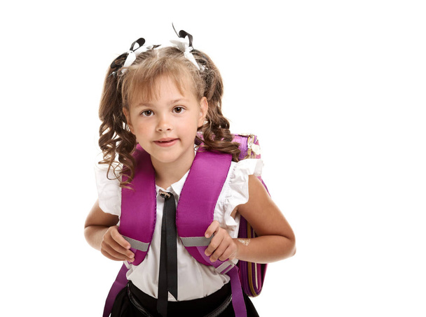 Portrait of beautiful little smiling schoolgirl wearing knapsack - Photo, Image