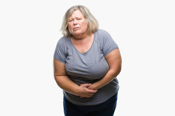 シニア プラス サイズ以上の白人女性と背景を分離された手の胃に消化不良、気分が悪く痛みを伴う病気。痛みの概念. - 写真・画像
