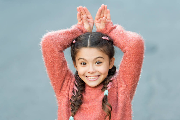 Happy little girl in autumn sweater. Small child with long hair. Casually beautiful. Happy childhood. Autumn snuggles. Autumn fashion for pretty girl. No cares. going crazy. Having fun - Φωτογραφία, εικόνα