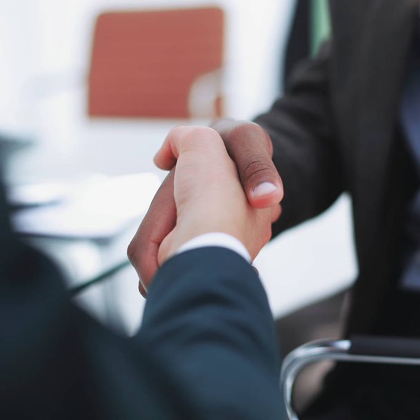 background image handshake trading partners .the business concept. - Photo, Image