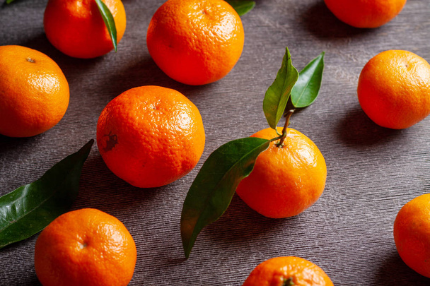 Fresh juicy clementine mandarins, winter time fruits.  - Photo, Image
