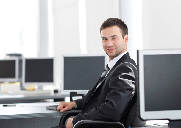 HR Manager sitting in a modern office before the start of the working day - Photo, image