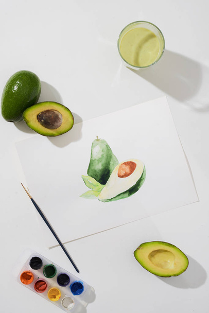 Tropical summer concept made of avocado fruit and hand drawing illustration. - Fotó, kép