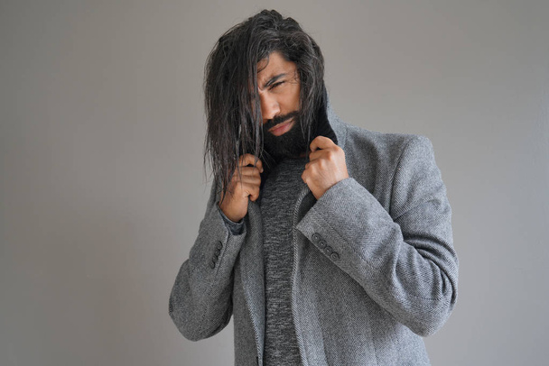 Hipster guy with grey coat, isolated - Photo, Image