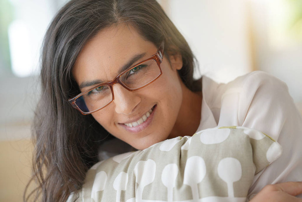 Portrait of smiling brunette woman with eyeglasses - Fotoğraf, Görsel