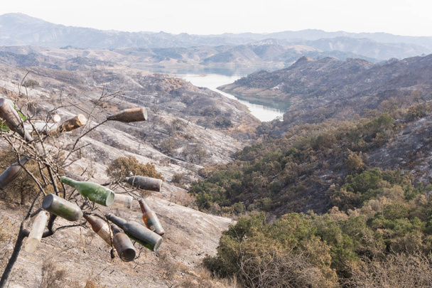 Collected glass bottles and views of Thomas Fire damage in the hills around Lake Casitas in Ojai, California - Photo, Image