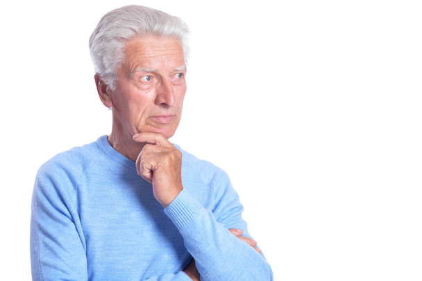 thoughtful  senior  man posing isolated on white background - Foto, Imagen