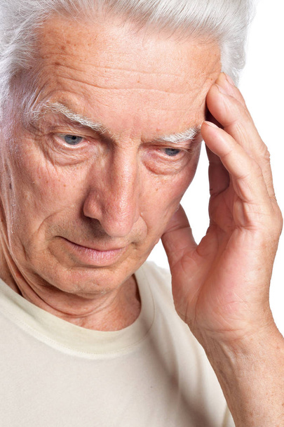  senior  man with headache  isolated on white background - Foto, afbeelding