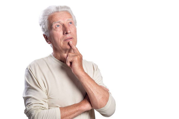 thoughtful  senior  man posing isolated on white background - Foto, immagini
