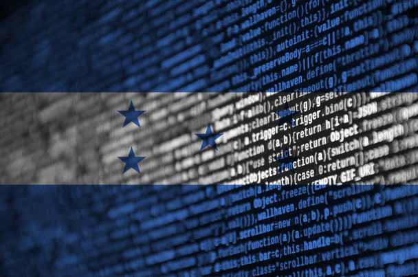 Hondurasin lippu näkyy näytöllä ohjelmakoodilla. Käsite modernin teknologian ja sivuston kehittämiseen
. - Valokuva, kuva