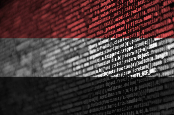 Jemenin lippu on kuvattu ruudulla ohjelmakoodilla. Käsite modernin teknologian ja sivuston kehittämiseen
. - Valokuva, kuva