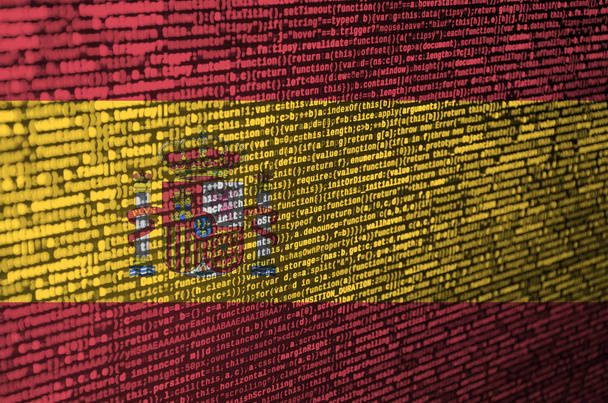 Espanjan lippu on kuvattu näytöllä ohjelmakoodilla. Käsite modernin teknologian ja sivuston kehittämiseen
. - Valokuva, kuva