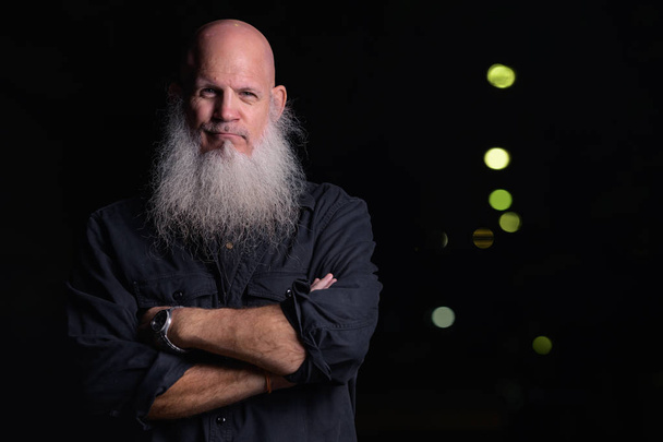 Portrait Of Bald Man With Gray Beard Outdoors At Night - Photo, Image