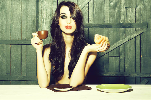 Sensual woman eating - Foto, Imagen