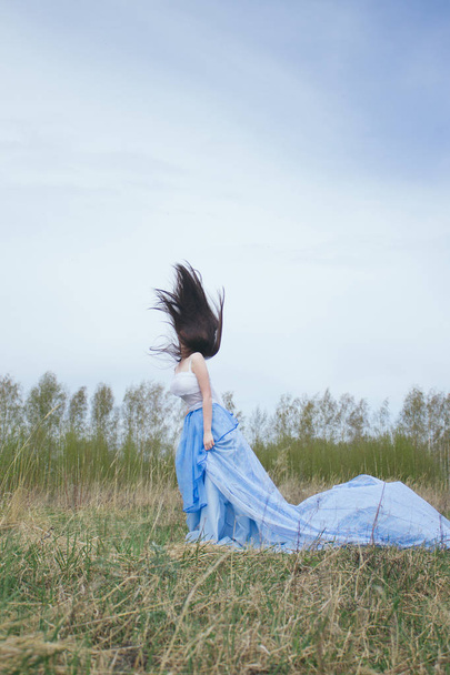 Beautiful woman with long hair/Freedom feeling - Valokuva, kuva