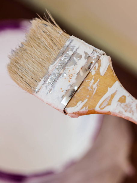 Home renovation, walls color change, diy concept. White paint with essentials equipment. - Foto, imagen