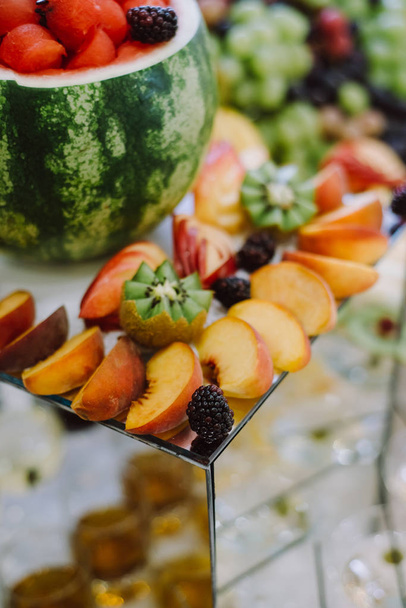 Fresh fruits on the buffet table - Фото, зображення