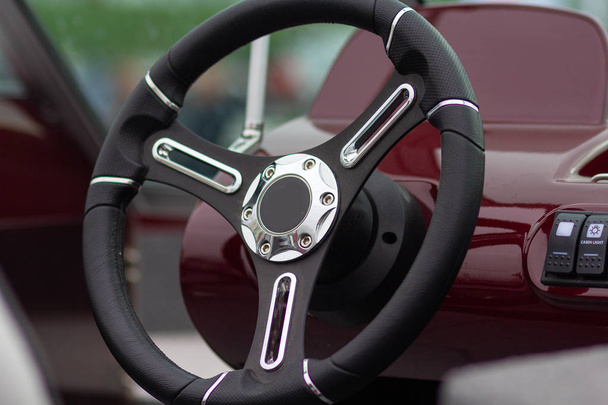 Steering wheel of a motor boat closeup. Transport - Photo, Image