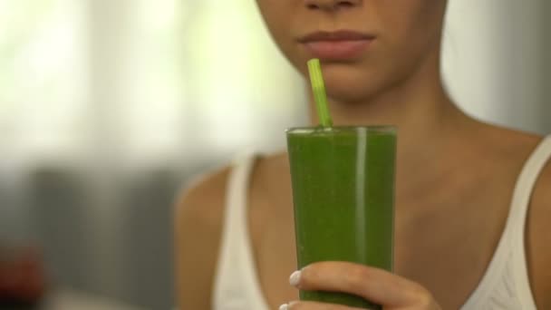Girl feels disgust to smoothie for weight loss, healthy but tasteless nutrition - Footage, Video