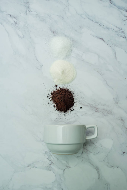 Explained hot coffee ratio Ingredients mix on marble background. Coffee, Sugar, Creamer - Zdjęcie, obraz