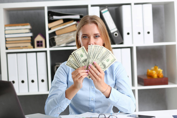 Beautiful businesswoman portrait. Scattering money - Photo, Image