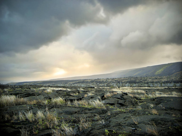 Lava Rock Landscape with Foreboding Clouds - Foto, immagini