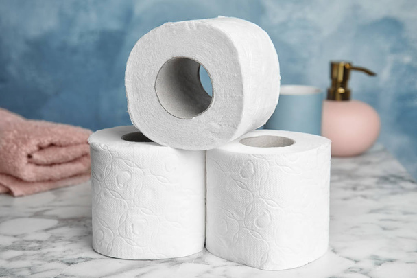 Toilet paper rolls on table. Personal hygiene - Fotó, kép
