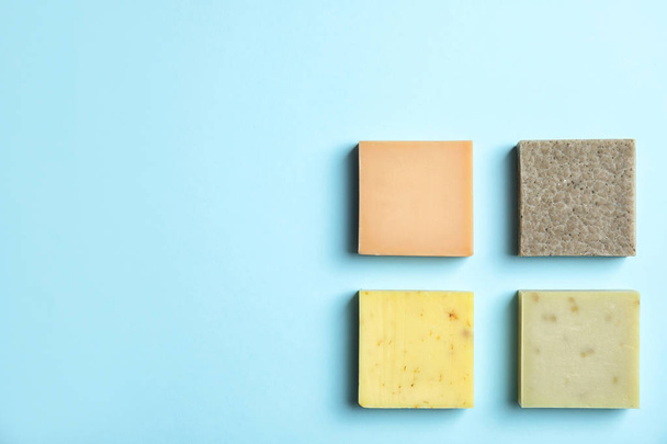 Hand made soap bars on color background, top view. Space for text - Fotoğraf, Görsel