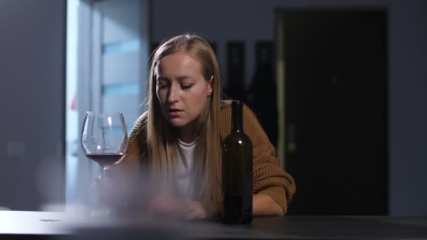 Wasted drunk woman in self-pity drinking alone - Footage, Video