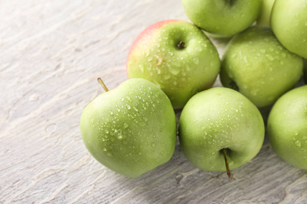 Ripe fresh apples on light table - Photo, Image