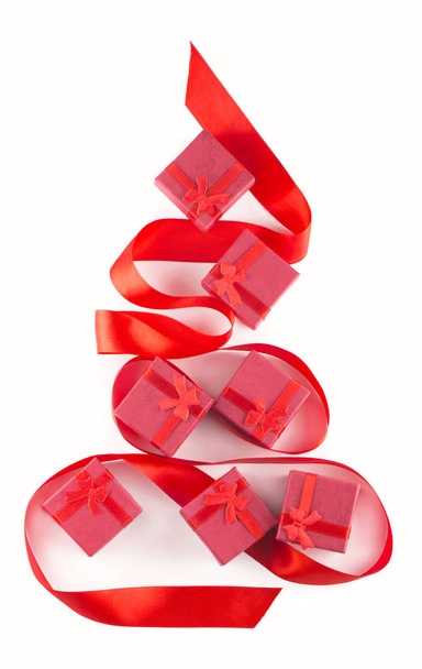 christmas tree of red ribbon and christmas gifts - Photo, Image
