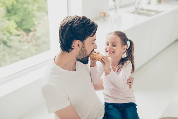Nice adorable lovely daddy and adopted girl, enjoying tasty yumm - 写真・画像