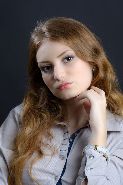 portrait of a beautiful blonde young woman in studio - Photo, image
