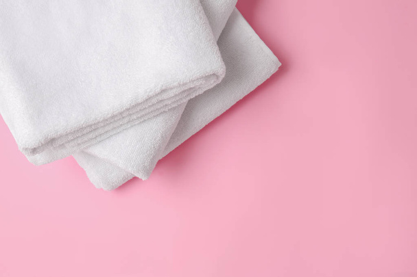 Clean soft towels on color background - Photo, Image