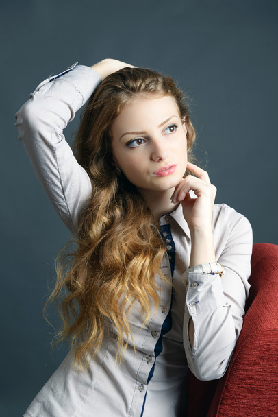 portrait of a beautiful blonde young woman in studio - Photo, Image