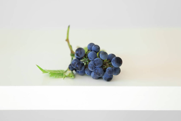 Ripe sweet grapes on white table - Photo, Image