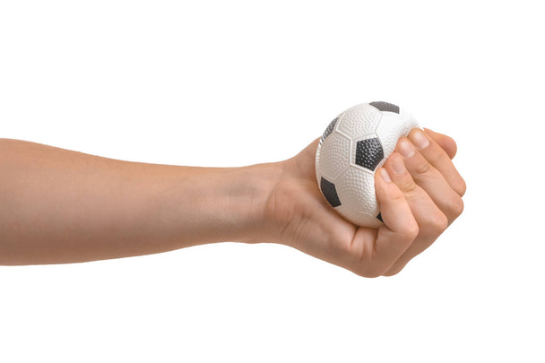 Man squeezing stress ball on white background - Photo, Image