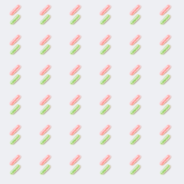 naadloze patroon van roze en groene medische capsules op wit - Foto, afbeelding