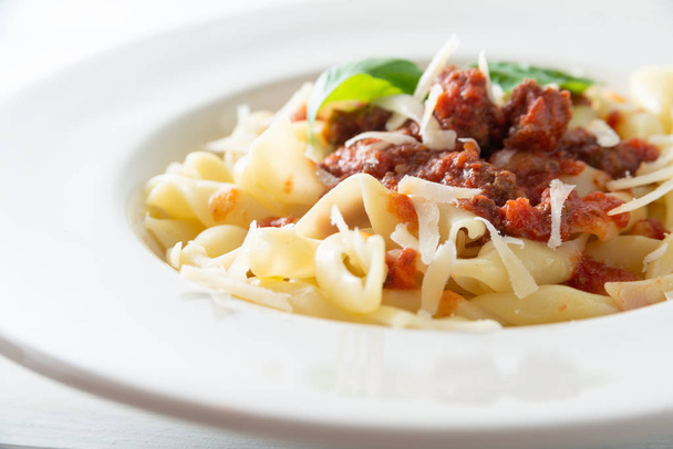 Dish of italian pasta with delicious wild boar ragout sauce and pecorino - Valokuva, kuva